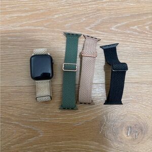 Apple Smartwatch with Black, Green, and Tan Bands